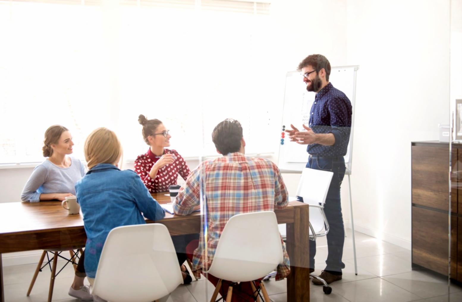 Financial planning session with charts and documents on desk
